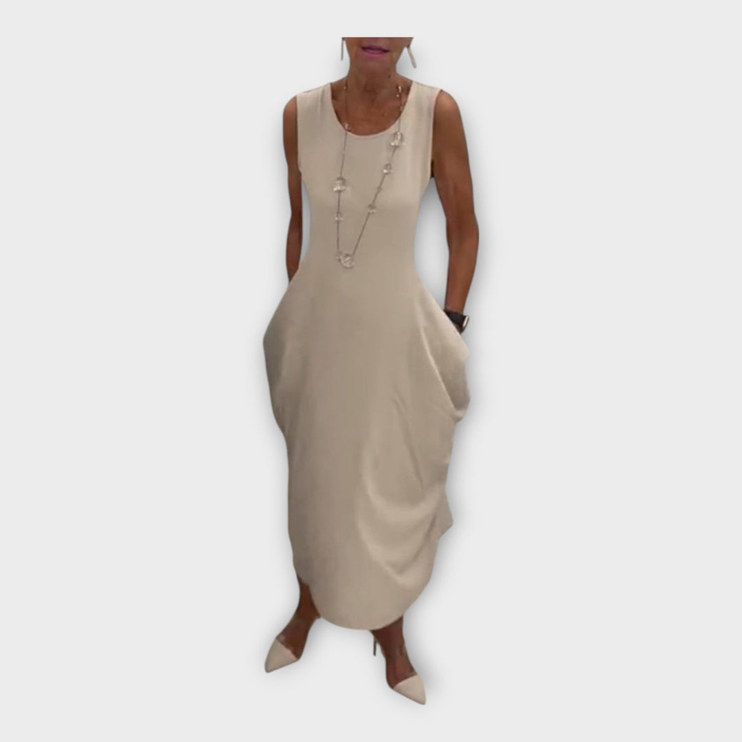 Light dress with a modern silhouette and pockets